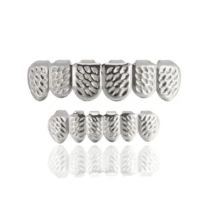 Silver hip hop grillz set, textured metal teeth caps for party and Halloween fashion style.