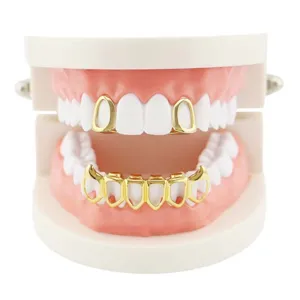 Close-up detail of 18k gold plated hip hop grillz, stylish vampire fangs dental teeth jewelry.