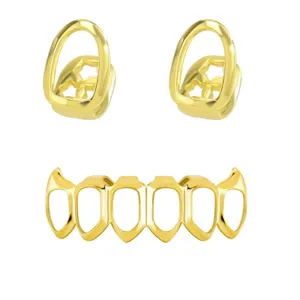 Gold grillz detail showing hollow vampire fangs and smooth metallic finish for hip hop style.