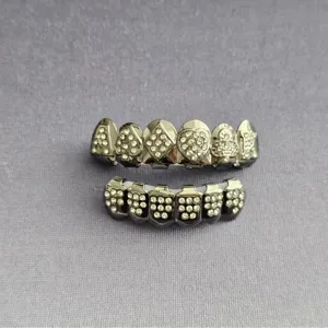 Hip hop grillz set with shiny cubic zirconia, poker design upper and lower teeth for party.