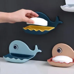 Porte-savon mural en forme de baleine mignonne avec design de drainage pour votre salle de bain.