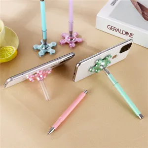 Creative suction cup phone holder gel pen, versatile 0.5mm ballpoint pen for office desk.
