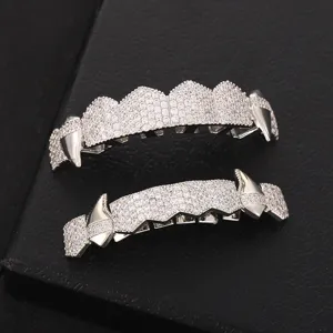 Silver vampire fangs grillz hip hop micro pave cubic zirconia teeth grill set for party.