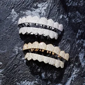 Hip hop 8-tooth iced out grillz set, dazzling cubic zirconia paved gold and silver teeth.