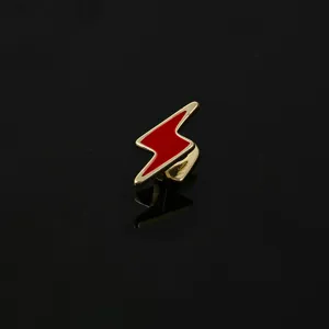 Detailed close-up of a trendy red lightning bolt grillz tooth cap, perfect for hip-hop style.