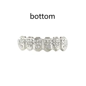 Close-up detail of silver rhinestone hip-hop bottom teeth grillz sparkling crystal grill accessory