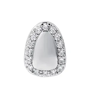 Detail shot of a stylish hip-hop single tooth grillz cap with sparkly paved cubic zirconia.