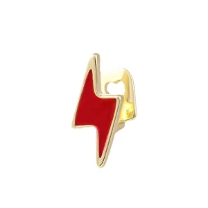 Gold single tooth dental grillz featuring a vibrant red enamel lightning bolt design for hip hop style.