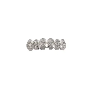 Close-up detail of silver rhinestone hip-hop grillz dental jewelry sparkling teeth grill