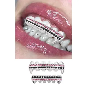 Hip hop vampire teeth grillz with pink and black rhinestones for Halloween fashion party wear.