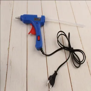Compact 20W hot glue gun with power cord and trigger for DIY crafts and handmade art projects.