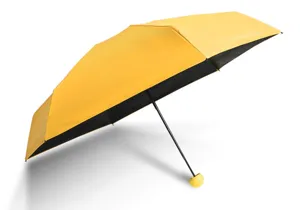Ombrello pieghevole mini capsula compatto con protezione UV e fodera nera per sole e pioggia.