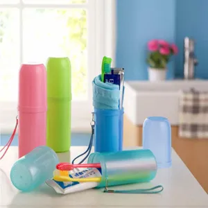 Portable plastic toothbrush travel cup set in cute macaron colors, ideal for outdoor trips.