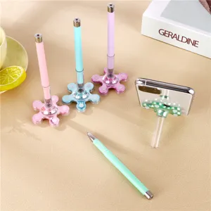 Creative suction cup phone holder gel pen detail, multi-color desk decor and writing tool.