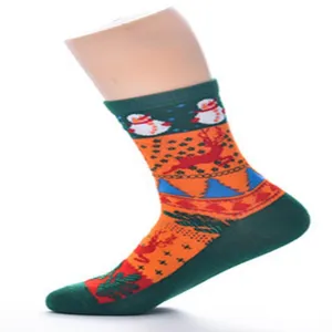 Women's Christmas mid-tube socks featuring cute snowman and elk patterns detail view.