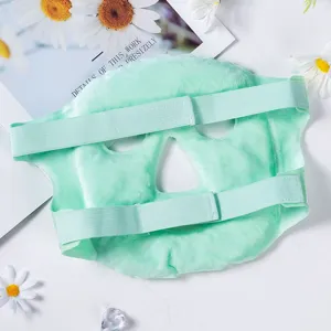 Green plush facial ice cooling mask with elastic straps for soothing spa and skin care treatment.