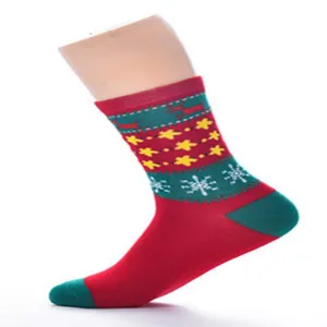 Christmas mid-tube socks for women with cute elk and snowflake knit patterns red green.