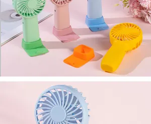 Portable mini handheld USB rechargeable fan with desktop stand, quiet and colorful design.