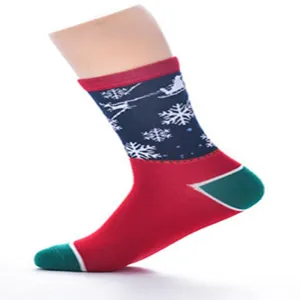 Women Christmas mid-tube socks cotton cozy festive snowflake reindeer red green pattern.