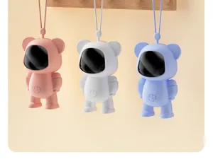 Detail view of cute cartoon astronaut hand warmers in pink, white and blue hanging neatly.