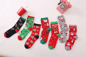 Christmas cotton socks detail view featuring festive Santa and cute winter holiday patterns.