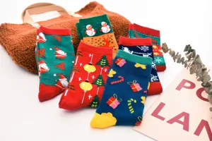 Christmas cotton mid-tube socks for women, featuring festive Santa and elk holiday patterns.