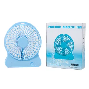 Portable USB desktop mini fan with rechargeable battery and cooling airflow for home office use.