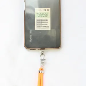 Universeller transparenter TPU Handy Lanyard Haltegurt mit leuchtend orangenem Tragegurt.