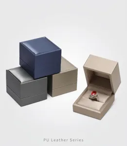 Detailed view of premium brushed PU leather jewelry boxes with an open ring case
