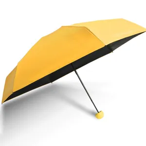 Compatto ombrello pieghevole mini capsula giallo protezione UV parasole con rivestimento nero