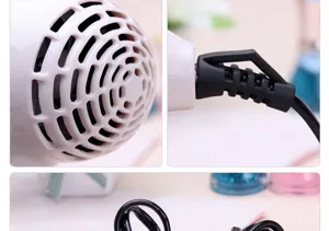 Portable foldable hair dryer in cute pink, ideal for daily dormitory use and travel styling.