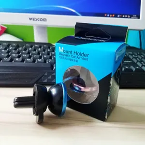 Detailed view of the magnetic car phone mount with air vent clip and metallic ring design.