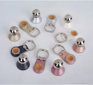 Detail shot of universal magnetic car phone mount and metal ring holders in various colors.