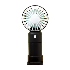 Mini ventilatore portatile con ricarica USB, design bicolore nero e bianco per uso da scrivania.