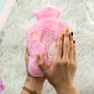 Pink plush hot water bag with cute cartoon rabbit print, thick warm water bottle for winter.