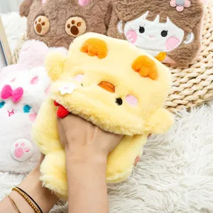 Cute plush hot water bag with removable duck cover, soft warm hand warmer for winter cozy use.