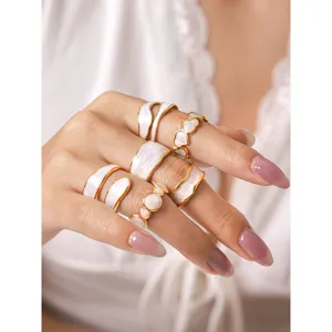 Chic irregular titanium steel oil drop ring set, elegant gold and white open rings for women.
