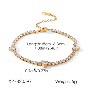 Gold stainless steel tennis bracelet with sparkling cubic zirconia heart charms for women.