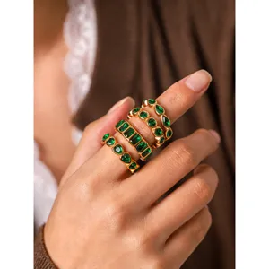 Chic 18k gold plated stainless steel stacking rings featuring sparkling green cubic zirconia stones.