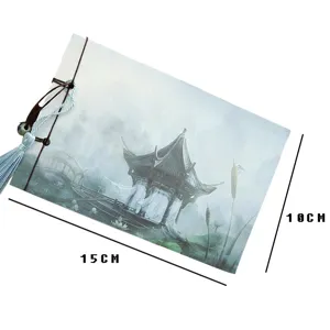 Chinese style vintage notebook journal with traditional pavilion painting and blue tassel.