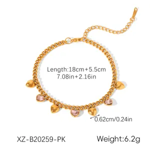 Detailed view of stainless steel heart bracelet with pink cubic zirconia charms and chain.