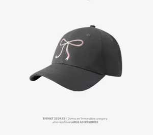 Women's dark grey baseball cap with a cute pink embroidered bow design for sweet casual daily wear.