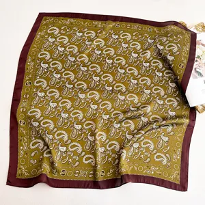 Women satin square scarf featuring classic paisley pattern in olive green and dark red border.