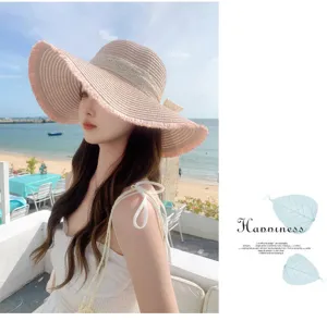 Women summer wide brim straw sun hat with bow and lace trim for beach outdoor travel.