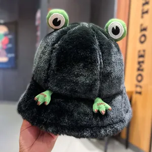 Detailed view of the cute black plush frog bucket hat showing soft texture and funny frog eyes.