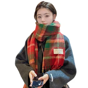 Christmas red green plaid winter warm cozy scarf worn by model for women cozy stylish apparel.