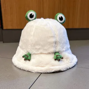 Cute plush frog bucket hat for women, thick fuzzy winter warm basin hat with cartoon design.