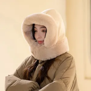 Close-up detail shot of the soft beige faux fur hood and warm winter balaclava trim.