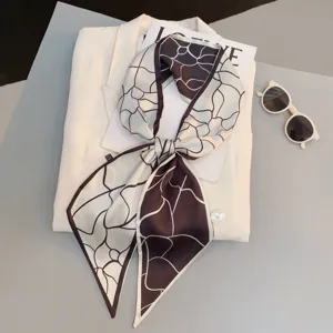 Narrow silk scarf elegant black white abstract pattern fashion neckerchief accessory detail view