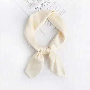 Elegant beige solid color silk imitation square scarf for women, chic neckerchief accessory detail.